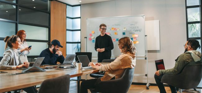 A face-to-face sales team collaborating in the office